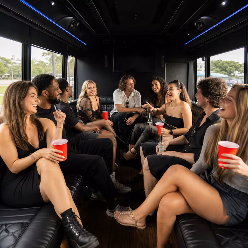 Group boarding a white charter bus for Concert Transportation transportation in Glendale