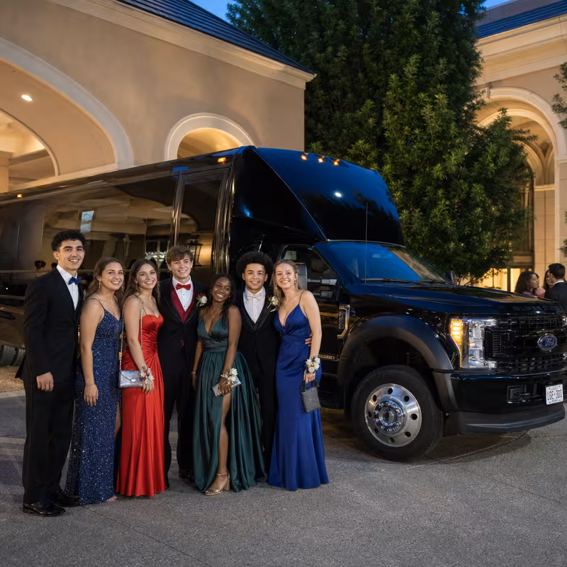 Party bus interior with wraparound leather seating and LED lighting in Glendale