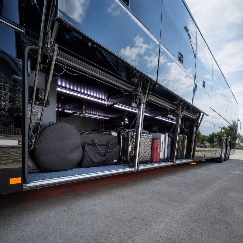 Party bus interior with wraparound leather seating and LED lighting in Glendale